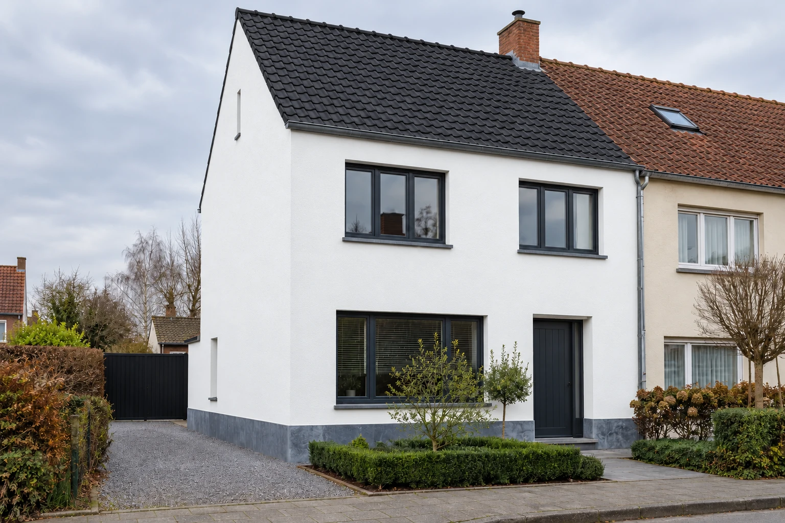 Spierwitte crepi bij een halfopen woning